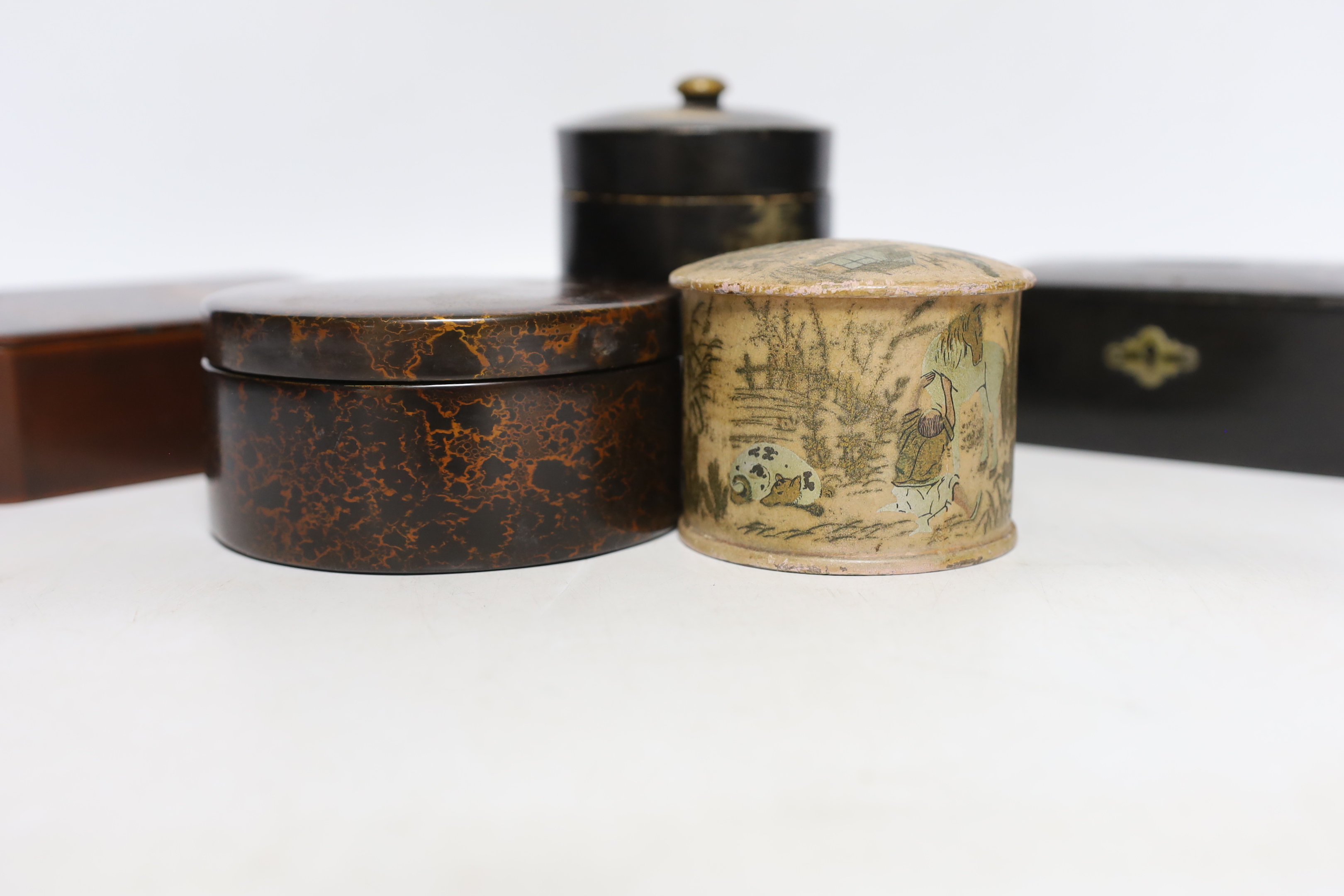 Six pieces of Japanese lacquerware comprising boxes and a small dish, largest 13cm wide